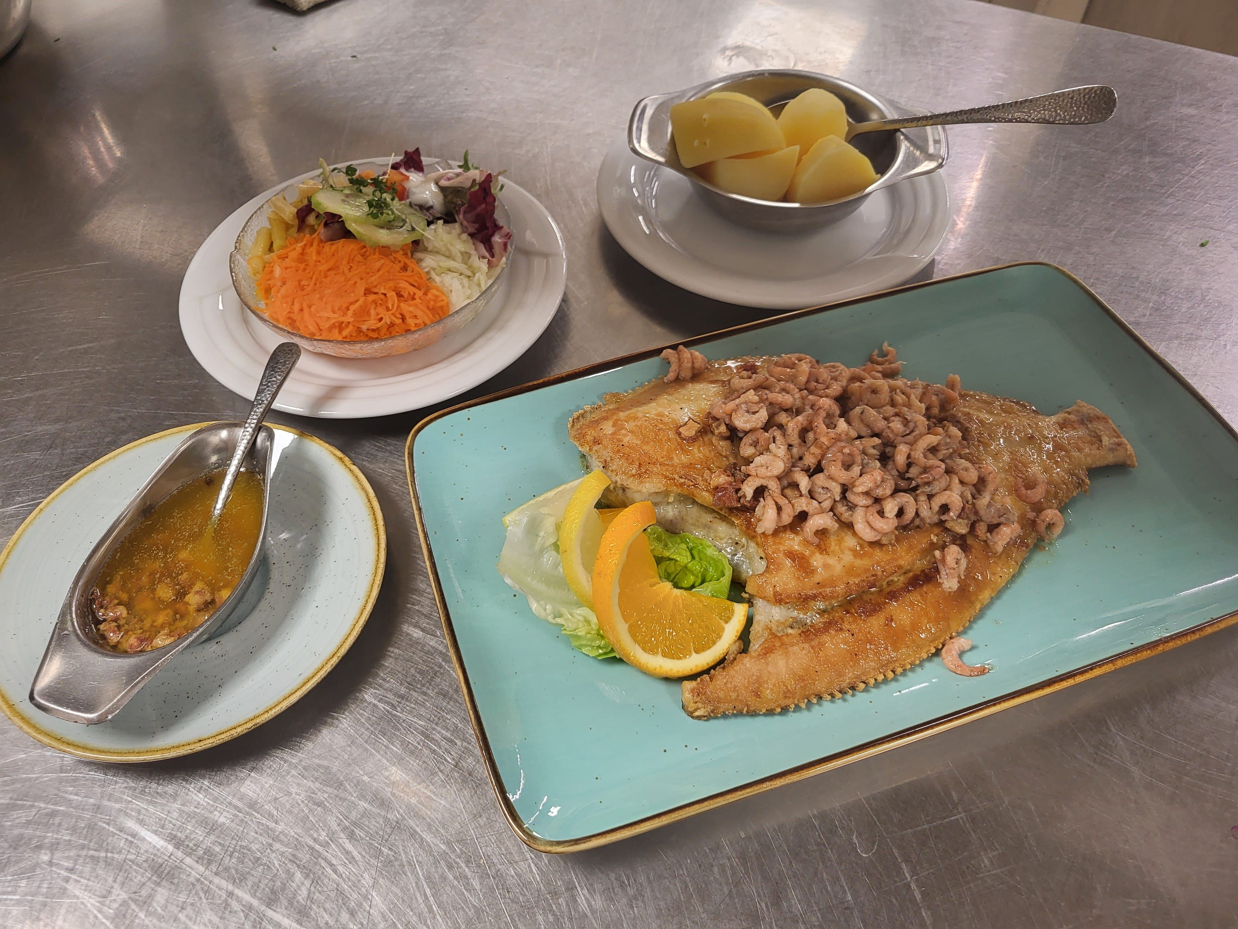 Traditionelles Fischgericht Traditionelles Fischgericht